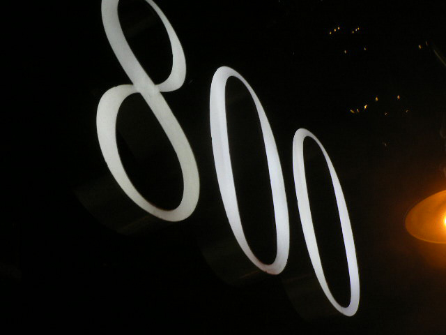 Front-lit channel letters on wall-800 number
